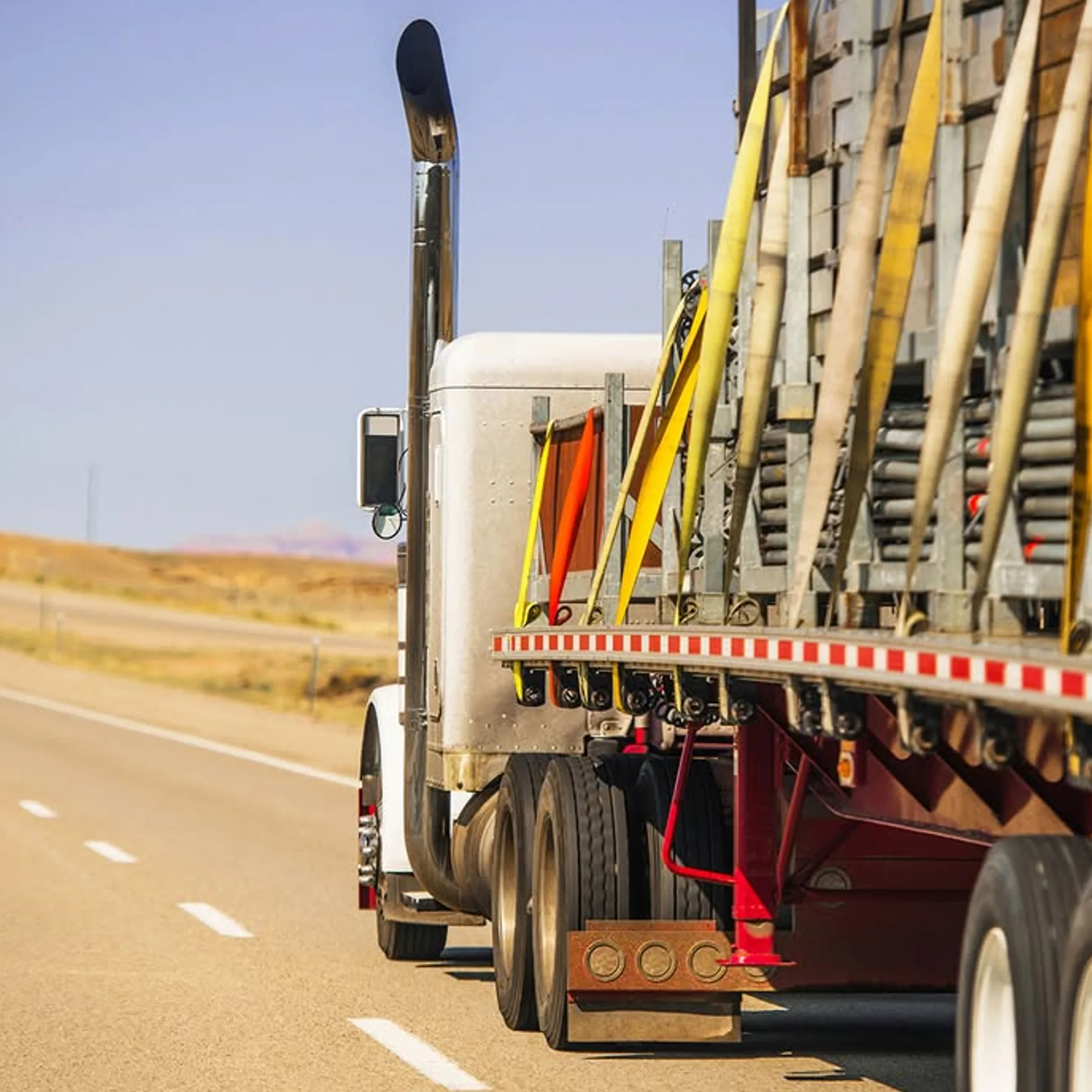 truck with secured load on road