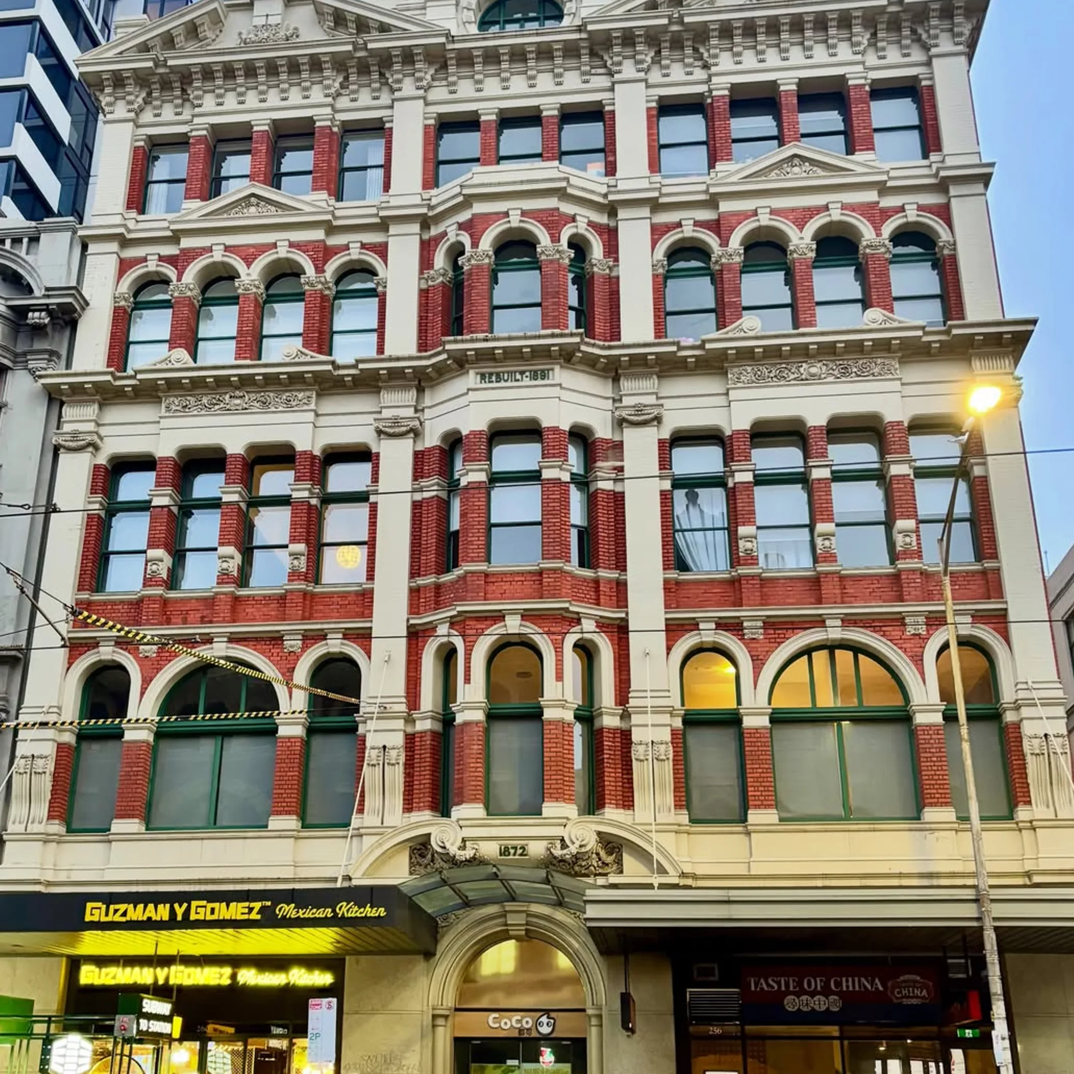 historic flinders street building at night